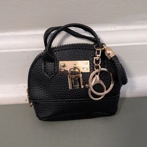 Elegant Black Handbag Charm with Gold Accents